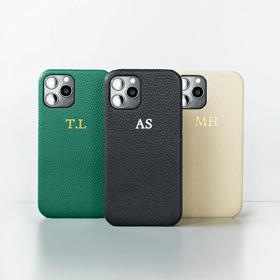 Pebble Genuine Leather iPhone Cases in Green, Black, & Grey with custom logo options.