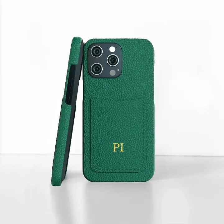 Green pebble-textured leather phone case with a pocket, designed for iPhone, offering a premium and stylish look with practical functionality.